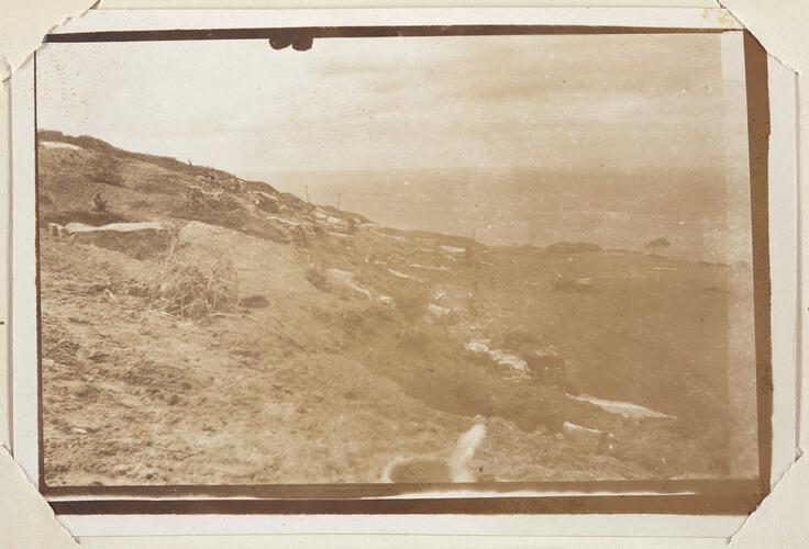 Hilly landscape with coastline on the right.