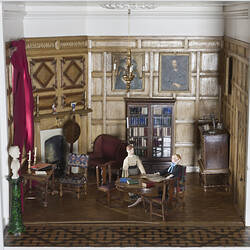 Miniature library, fully furnished in doll's house.