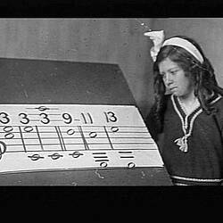 Photograph - Ethelwyn Pitts Looking at Sheet Music, Merrigum, Victoria, circa 1910s