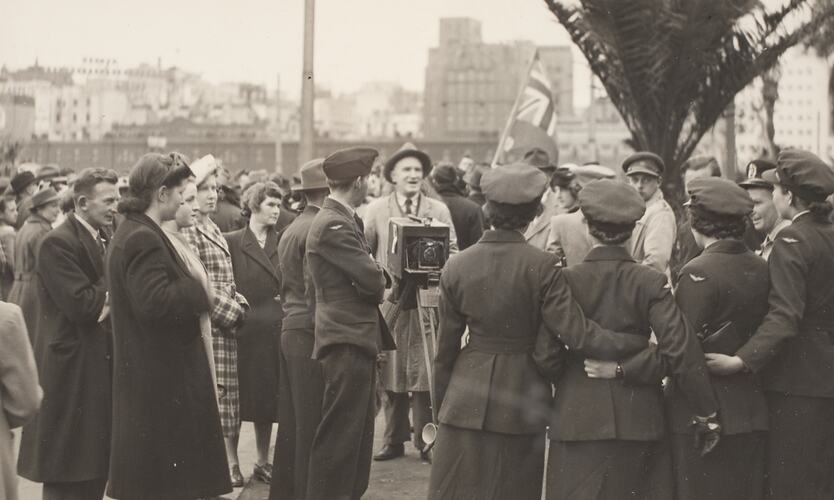 Photographer, Service Women & Crowds on 'Peace Day', Melbourne, 1945