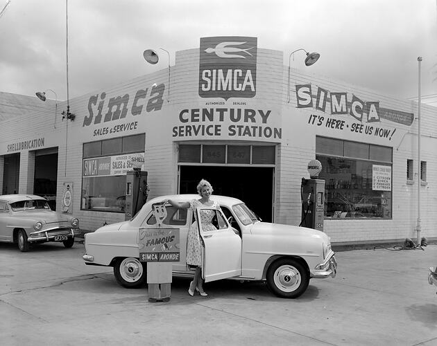 Century Service Station, Woman Posed with Car, Richmond, Victoria, 06 Mar 1959
