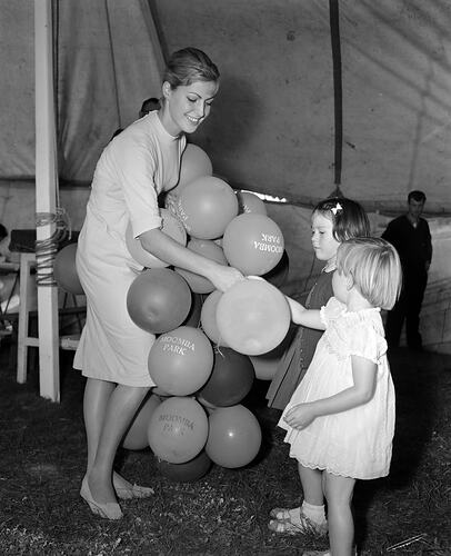 Moomba Estate, Woman with Balloons, Victoria, 11 Apr 1959