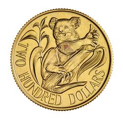 Round gold coin with koala.
