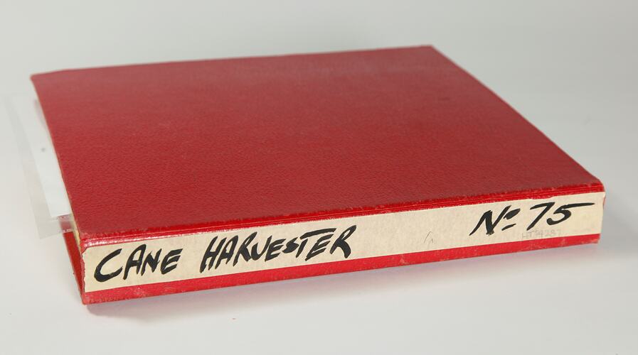 Photograph Album of harvesting equipment.