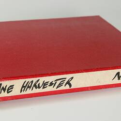 Photograph Album of harvesting equipment.