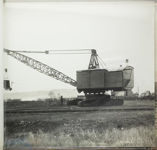 Monochrome photograph of a dragline excavator.