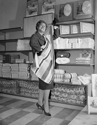 Woman Standing in Front of a Display, Coltons General Drapery Store, Toorak, Victoria, 07 Mar 1960