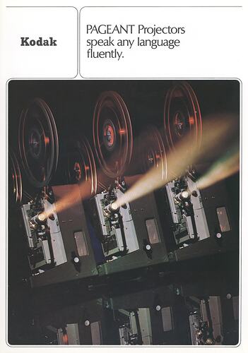 Cover page with photograph of projectors operating.