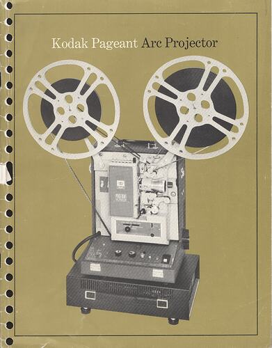 Green cover page with photograph of projector.
