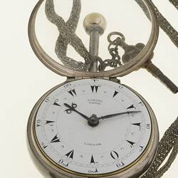 Gentleman's pocket watch in case and attached to silver plaited chain. White dial.