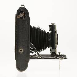 Right profile of fold out black camera.