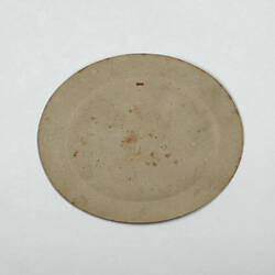 Reverse of oval paper plate.