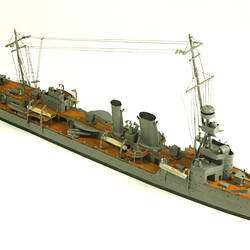 Naval ship with mast, three quarter view.