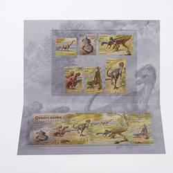 Open stamp pack with six separate dinosaurs at top and the set joined at the bottom.