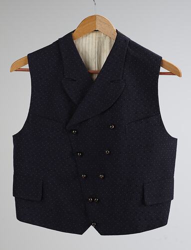 Double-breasted navy woollen waistcoat. Two rows of four buttons down the front.