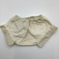 White doll's underwear with lace trim.