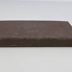 Brown cloth bound book.