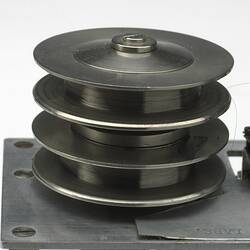 Metal reel with four levels. Detail.