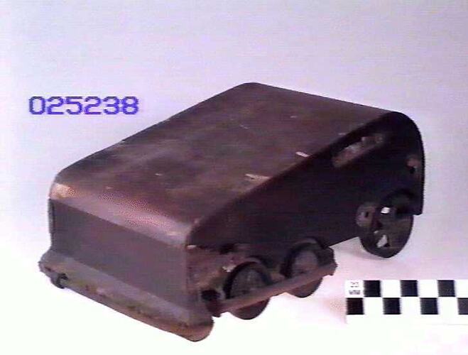 Wooden body of vacuum cleaner.