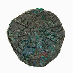 Coin, round, legend around central cross, text '+ EDILRED REX'.