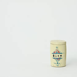 Round cream painted canister labelled Rice