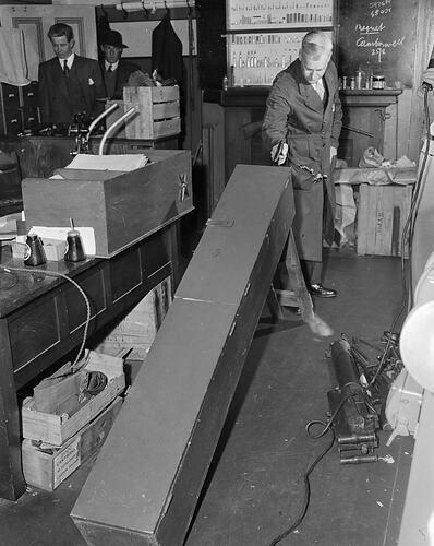 Man Shooting Gun into a Box, Melbourne, Victoria, 1953