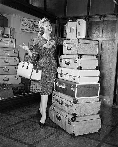 Negative - Woman Modelling Luggage, Fitzroy, Victoria, 1958