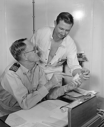 Two Workers in Office, Victoria, Sep 1958
