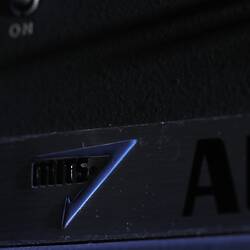 Close up of company symbol on computer hardware.