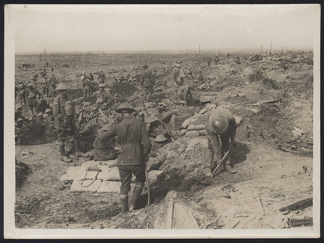 Soldiers in damaged battlefield.