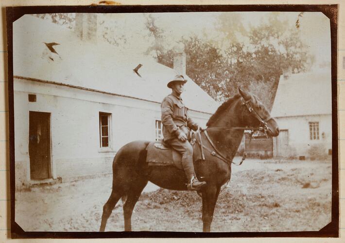 Soldier sitting on a horse.