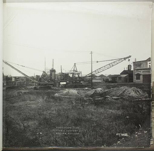 Monochrome photograph of a dragline excavator.