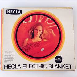 Front of electric blanket box with photo of woman.