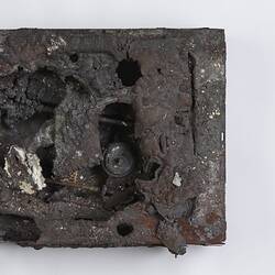 Fire afffected melted computer hard drive.