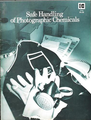 Cover page with apron, mask and chemicals.