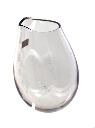 Incomplete bowl of a glass goblet with a rough rim.