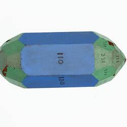 Wooden crystal model painted blue and green.