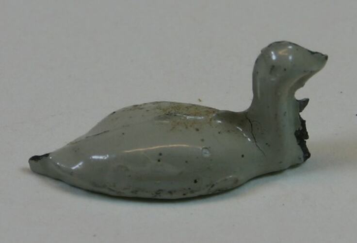 Toy metal white swan.