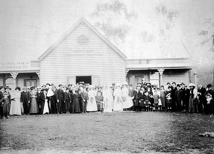 [A wedding party outside the Gormandale mechanics institute, about 1910.]