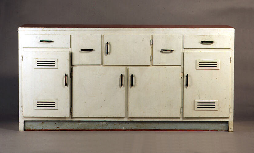 Kitchen lower cupboard unit with doors and drawers.