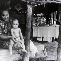 Negative - Woman with Two Children in Pavilion, Pacific Islands, circa 1930s