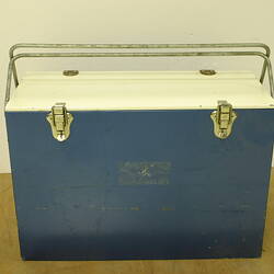 Blue cooler with white lid and metal handles.