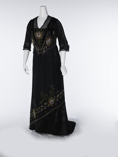 Black, silk satin dress, beading, floral embroidery.