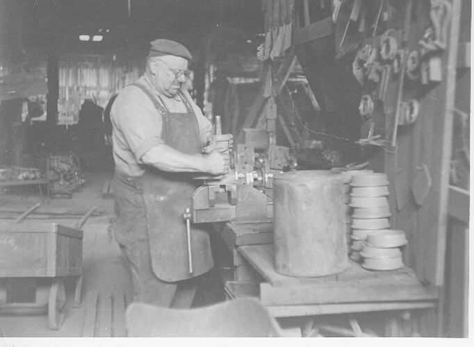 Photograph - Workman in engineering workshop
