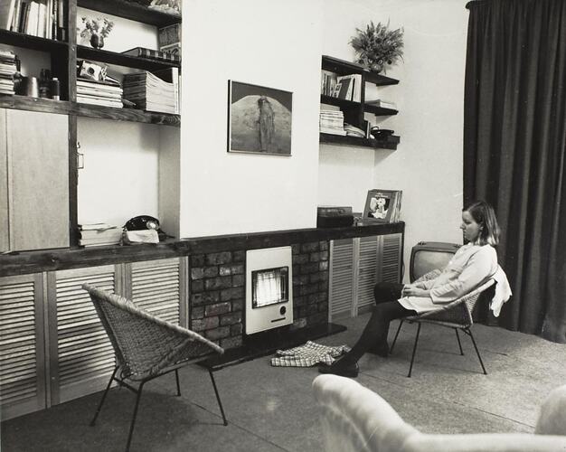 Digital Photograph - Woman Sitting Drying Baby Jumper in front of Heater, Lounge Room, Prahran East, 1967