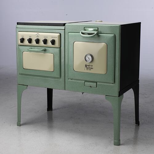 Green and cream old fashioned electric stove.
