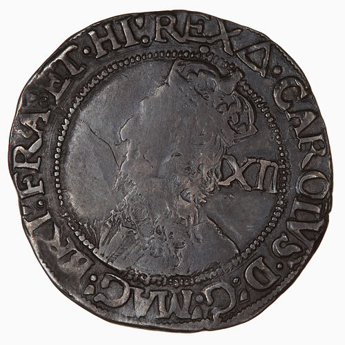 Coin, round, Crowned bust of the King facing left wearing a lace collar and armour; text around.