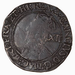 Coin, round, Crowned bust of the King facing left wearing a lace collar and armour; text around.