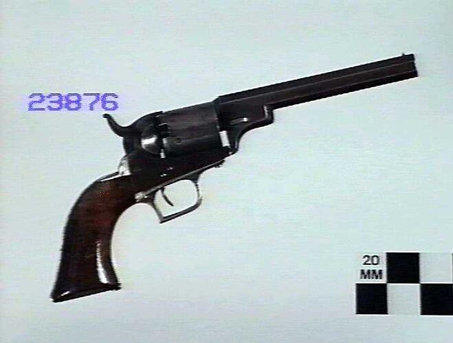 Metal and wooden revolver.