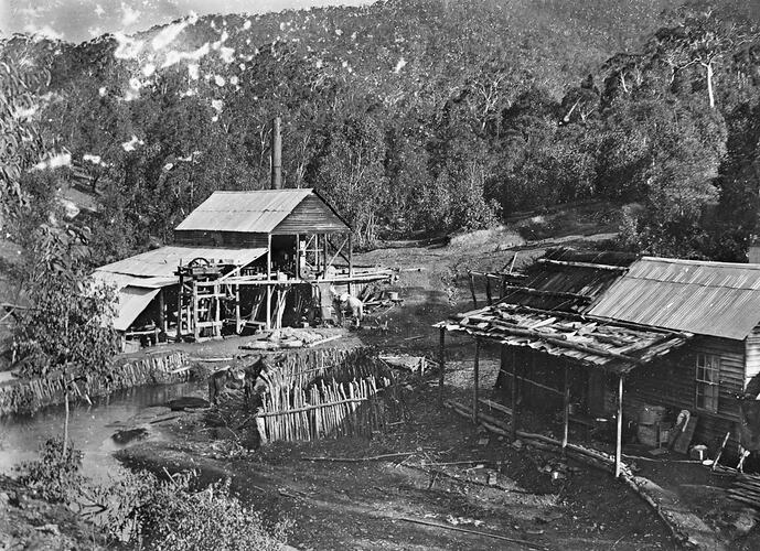 Wood mill and nearby workers' huts.
